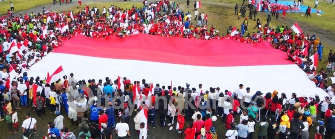 Gelar Kibar Merah Putih , PJ Bupati Puncak Jaya Kibarkan Semangat Persatuan.